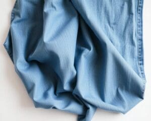 Hoe voelt chambray vergeleken met denim?